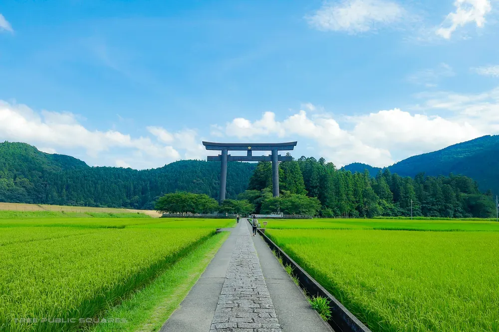 The great torii of Ōyunohara standing over rice fields, Kumano